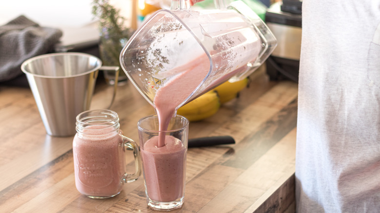 pouring milkshake from blender