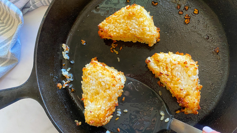 Onigiri being cooked on the pan