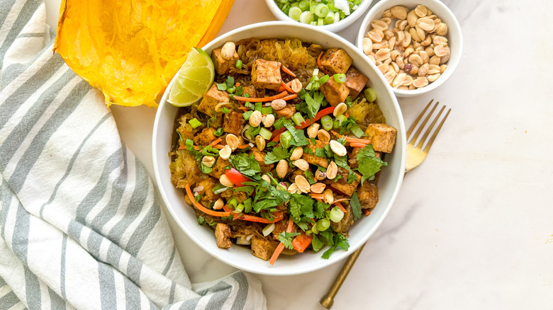 Overview of spaghetti squash pad thai in bowl with fork