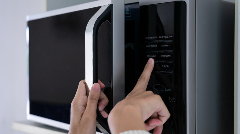 Hands on a microwave