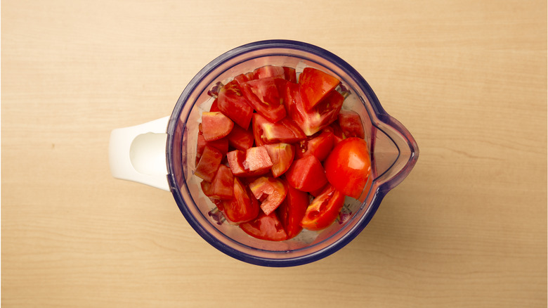 chopped tomatoes in blender