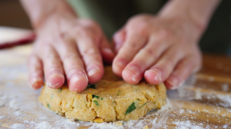 hands forming veggie burger patty