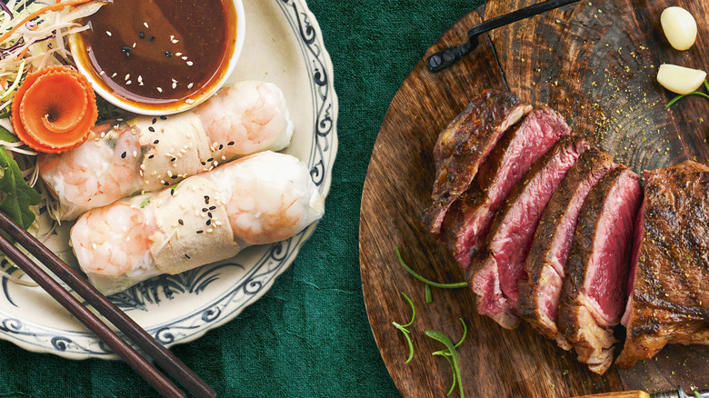 Summer rolls and sliced steak