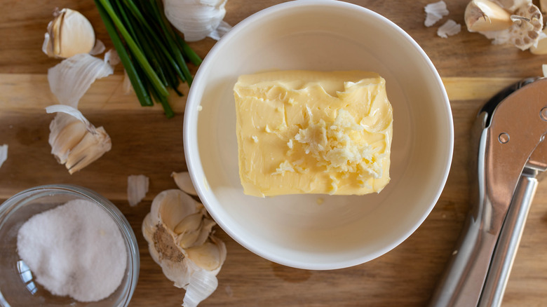 garlic press and compound butter ingredients