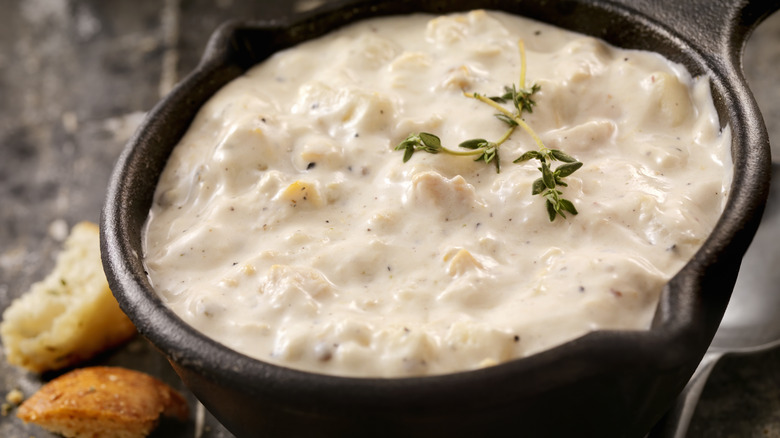 cast iron bowl of clam chowder