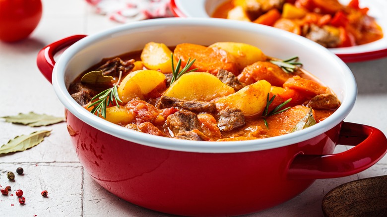 Beef stew in red bowl 