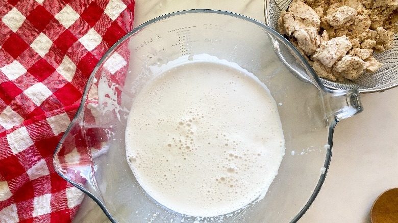 strained almond milk and pulp