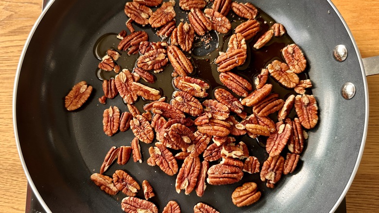 Heat pecans and maple