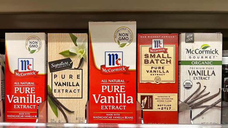 Boxes of vanilla extract on grocery store shelf