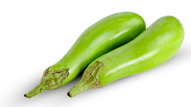 Two green eggplants