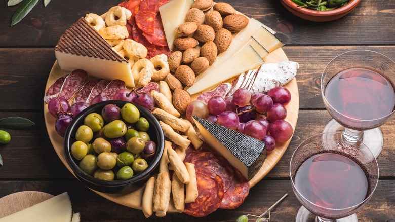 cheese board with mixed olives