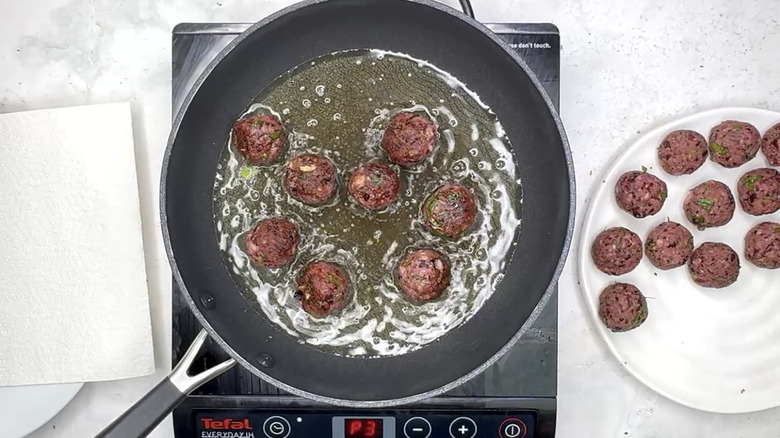frying "meatballs" in pan