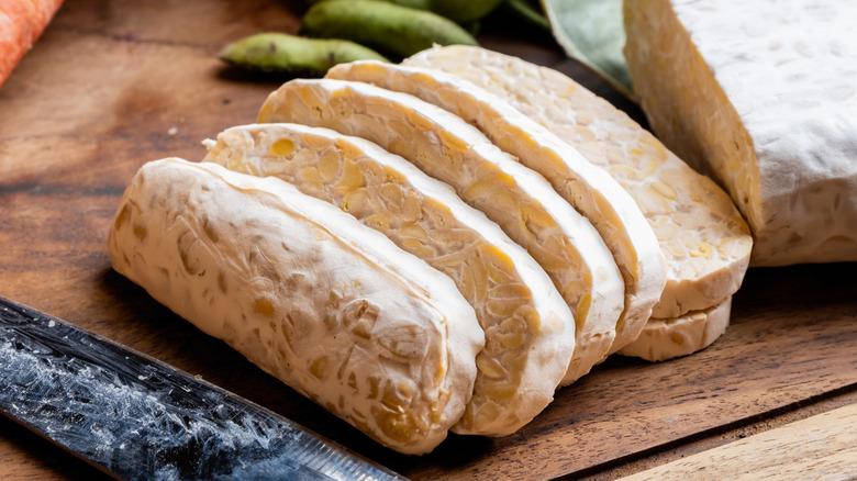 sliced tempeh on wooden board