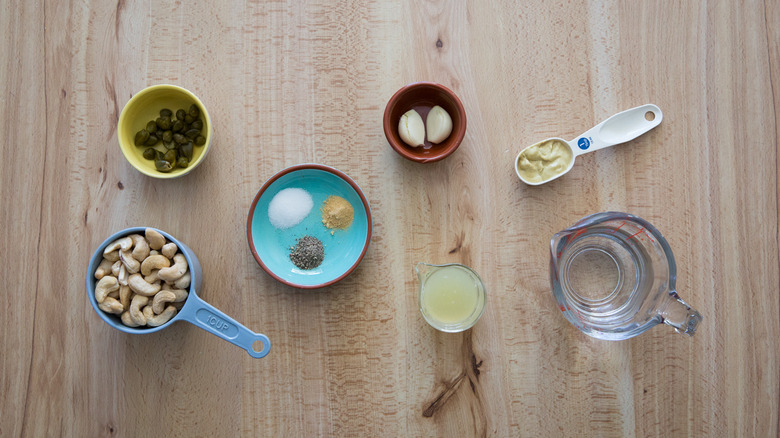 Caesar dressing ingredients on table