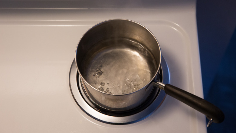 water boiling in small saucepan