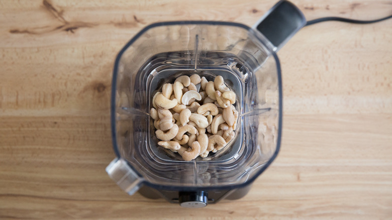 cashews sitting in blender cup