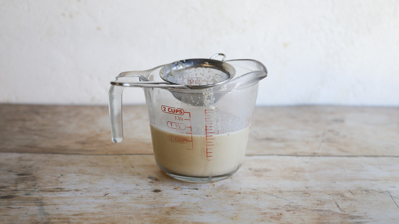 Straining graham cracker milk