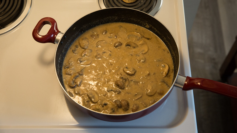 mushroom tahini sauce in pan 