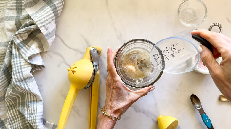 adding water to sauce