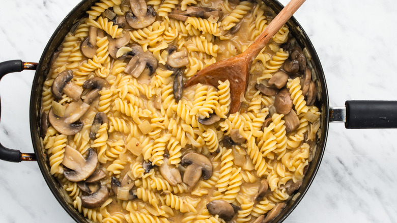 stirring pasta