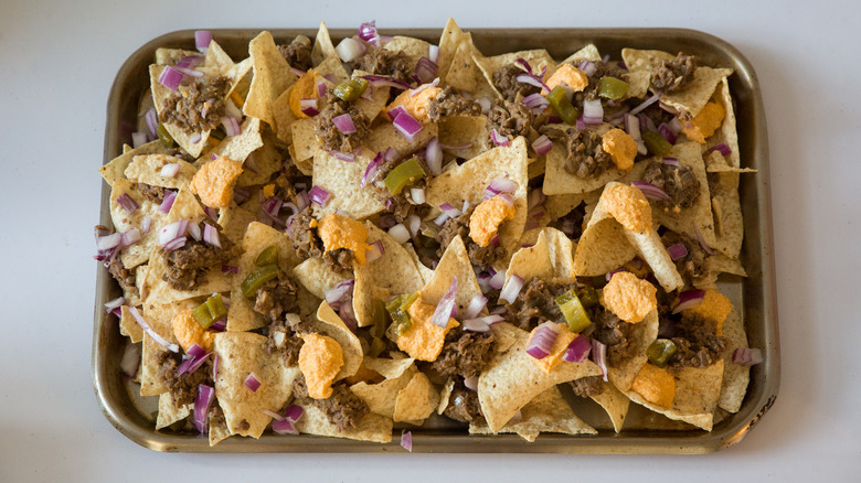 chips and toppings on pan 