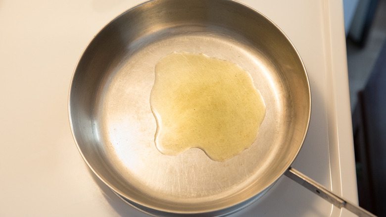 olive oil heating in pan 