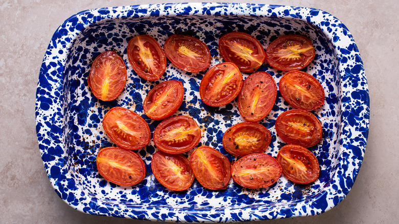 roma tomatoes in casserole dish