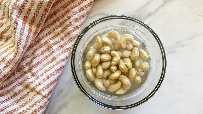 bowl of cashews in water