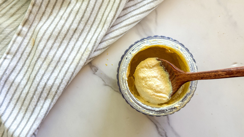 spoon with cashew cheese sauce