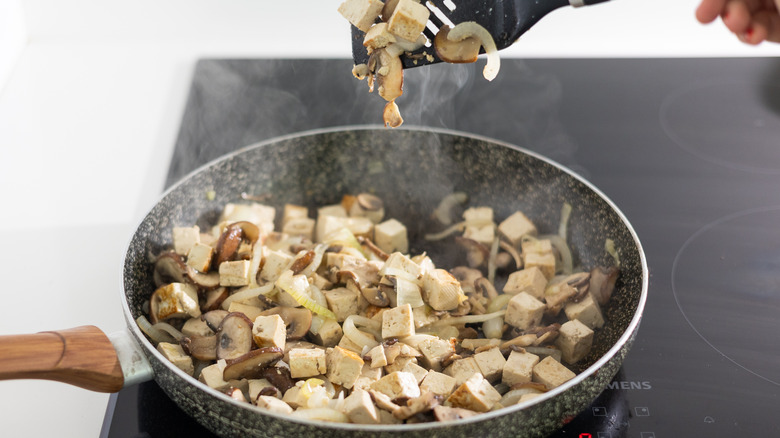 tofu mushrooms onions in pan