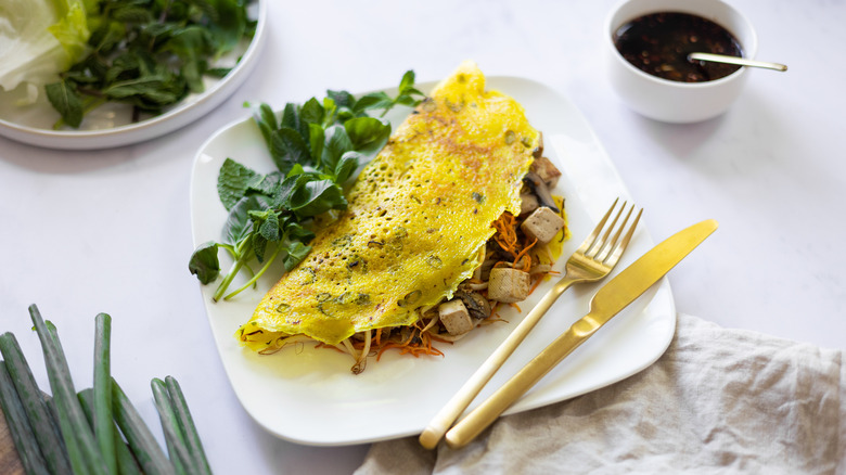 Vietnamese crepe with garnishes