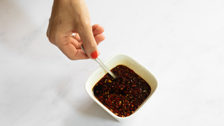 mixing dipping sauce in bowl 