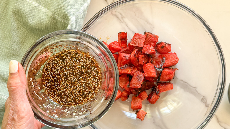 Adding sauce to watermelon