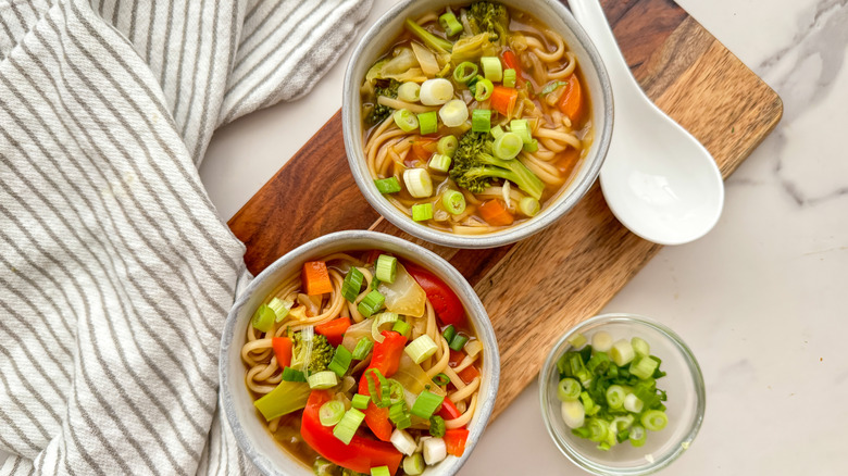 tray with 2 bowls of soup