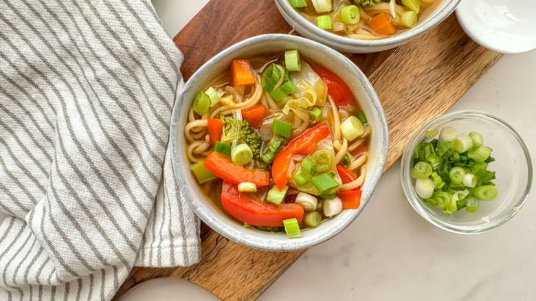 bowl of soup with scallions