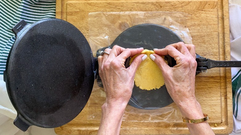 dough on tortilla press