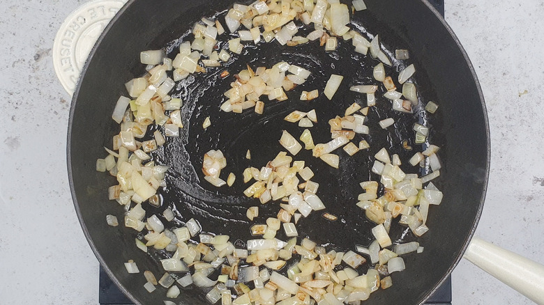 Onion frying in pan