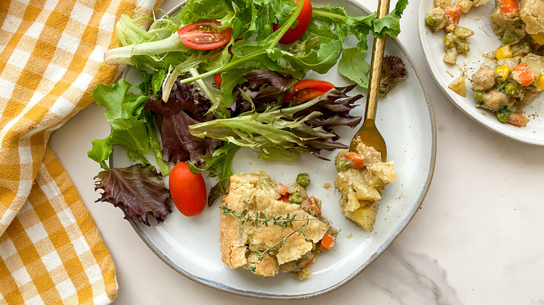 slice of pie with salad