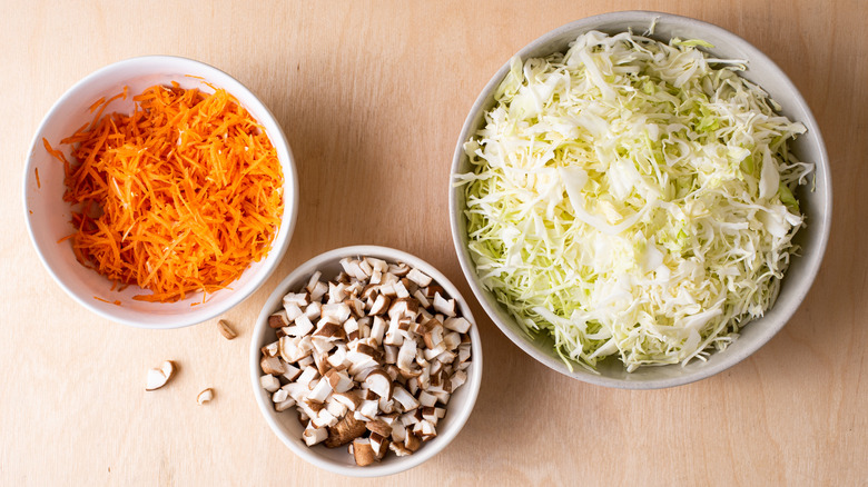 chopped vegetables in bowls