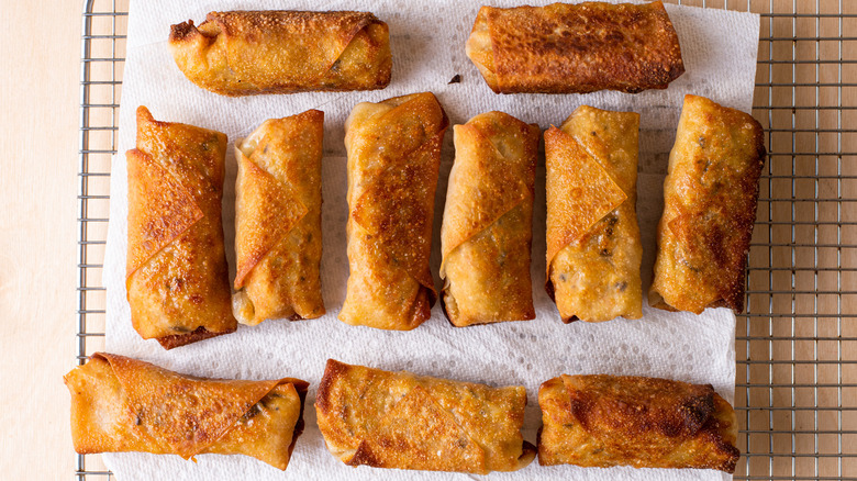 fried egg rolls on a cooling rack