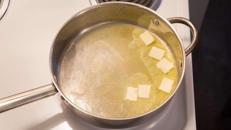 butter melting in large saute pan