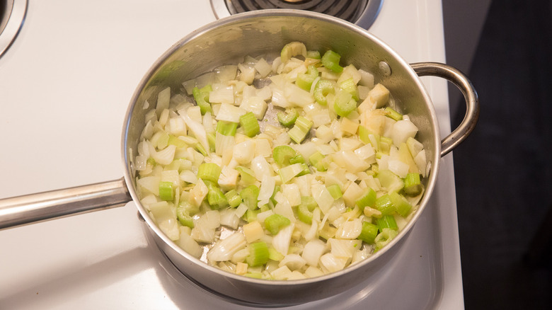 vegetables cooking in large pan