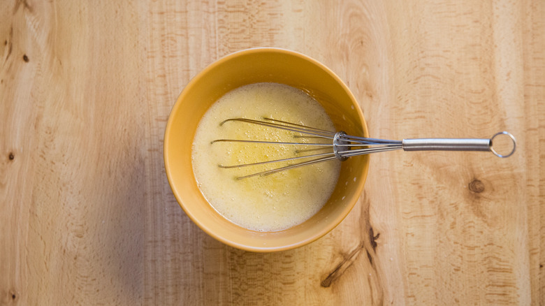 milk and butter in bowl