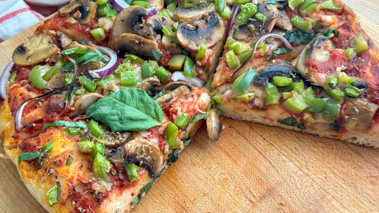 veggie pizza with slices removed