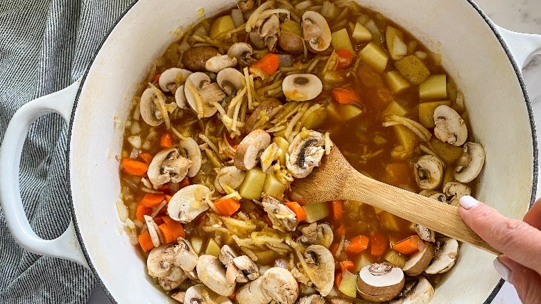 curry ingredients in white pot