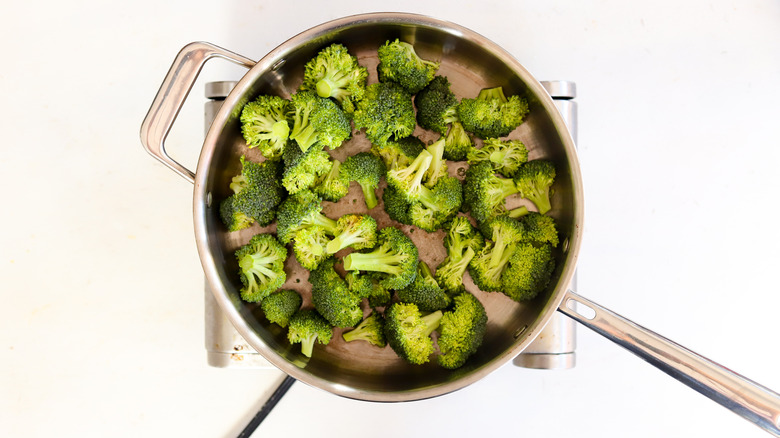 cooked broccoli in a pan