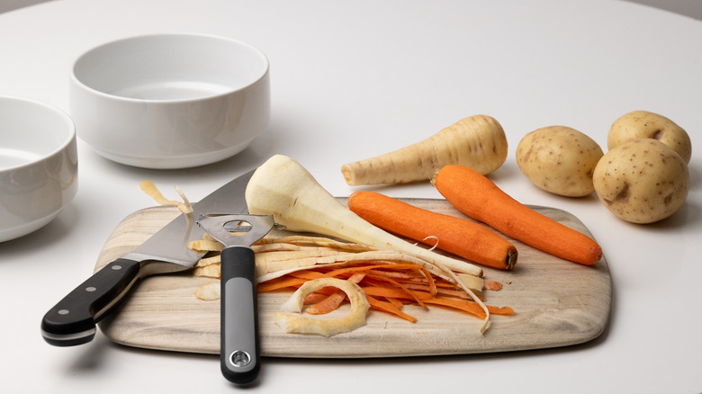 peeling carrots and parsnips