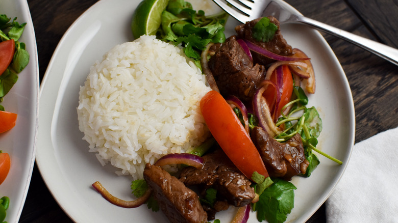 beef and rice on plate 