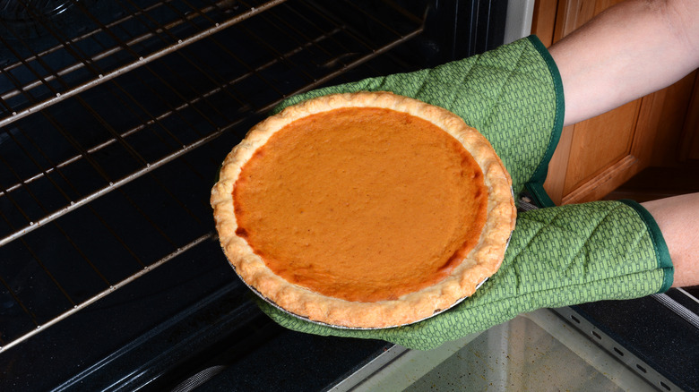 Pumpkin pie in oven