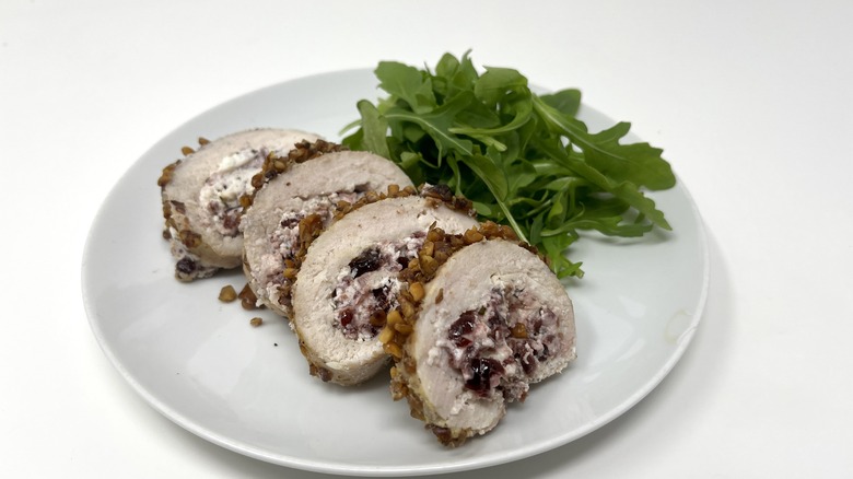 walnut chicken roulade with greens